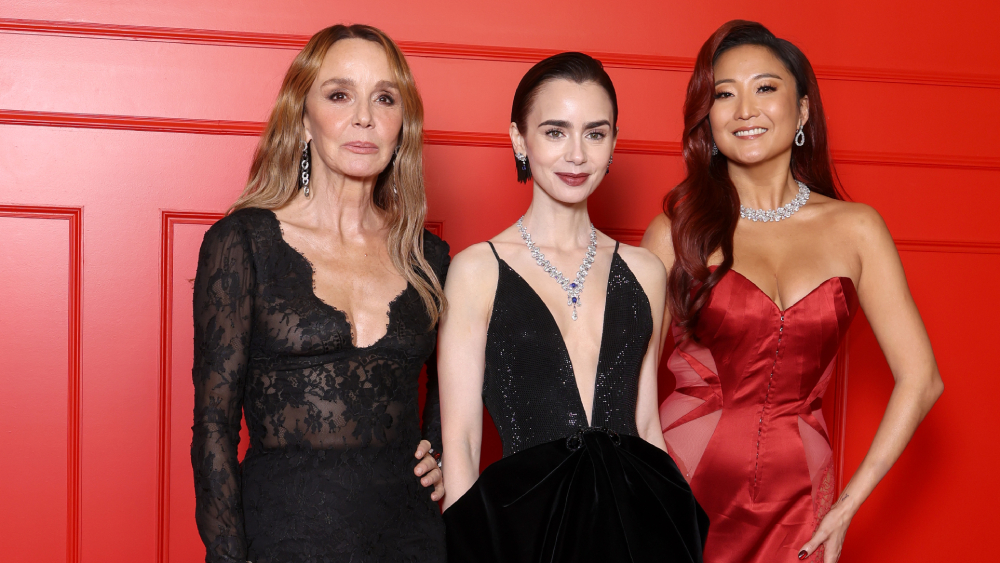 Lily Collins, Heated Rivalry's Connor Storrie PARIS, FRANCE - DECEMBER 15: Philippine Leroy-Beaulieu, Lily Collins and Ashley Park attend the "Emily In Paris" - Season Five - Netflix Paris Premiere at Le Grand Rex on December 15, 2025 in Paris, France. (Photo by Pascal Le Segretain/Getty Images)