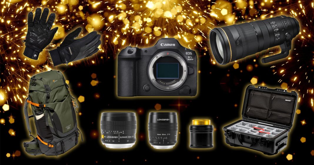Didn't Get What You Wanted for Christmas? These Deals Will A collection of photography gear, including a Canon camera, three lenses, a telephoto lens, a green backpack, gloves, a memory card case, and a hard equipment case, all set against a fireworks background.