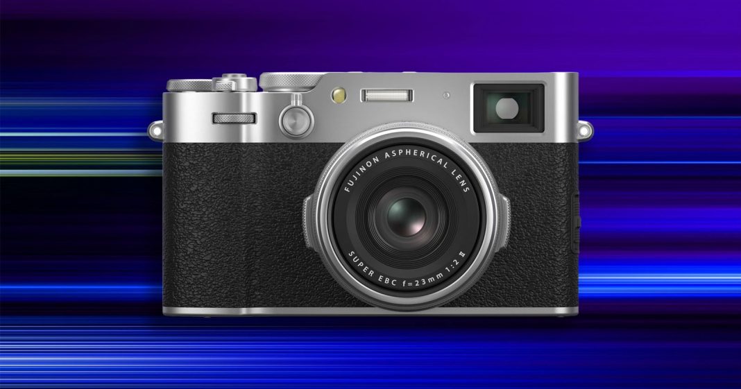 A silver and black Fujifilm camera with a large lens is centered against a vibrant, blue and purple striped background with a motion blur effect.