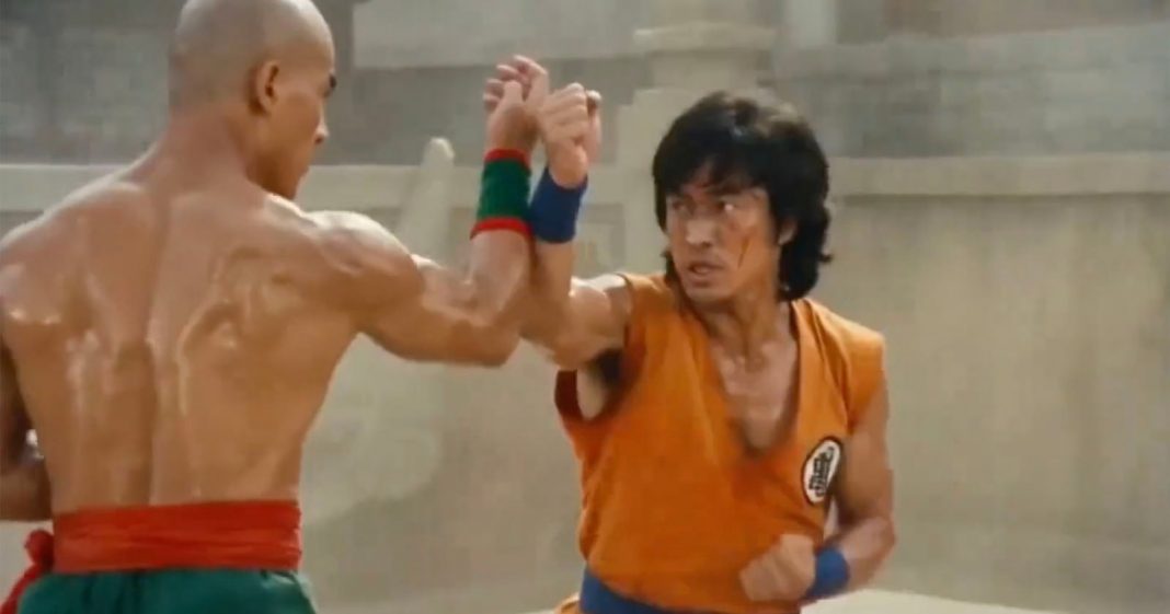 A New AI Video Model From ByteDance is Making Waves Two men are engaged in a martial arts fight, wearing sleeveless outfits with colored belts and wristbands. One has short hair and is shirtless, the other has shaggy hair and an orange shirt with a round emblem.