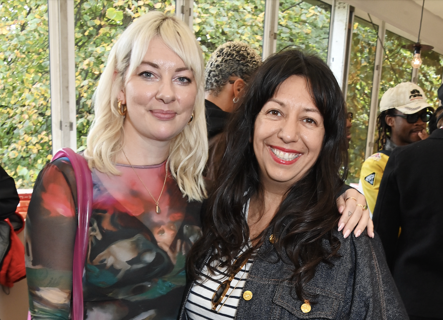John Akomfrah, Isaac Julien Sign Letter in Support of Devyani Two women smiling at the camera.