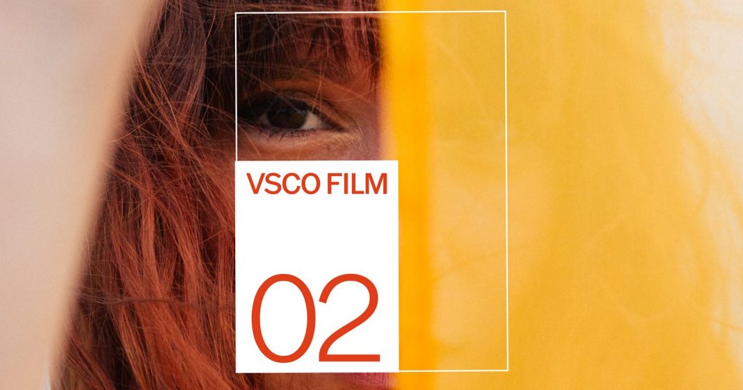 A close-up of a person’s face partially obscured by yellow fabric, with text “VSCO FILM 02” in a white box with orange letters and numbers overlaying the image.