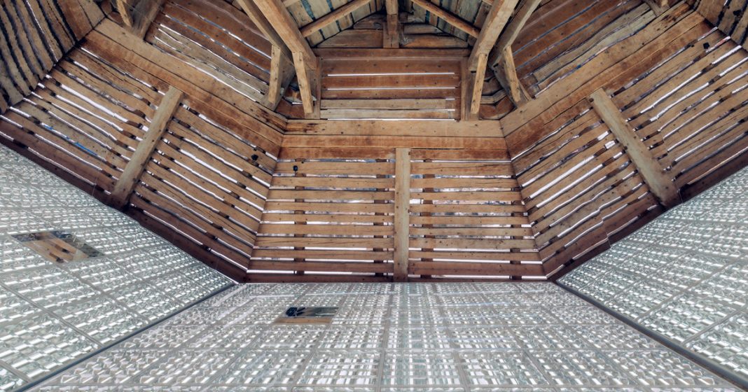 alexandre de betak inserts reflective light installation into swiss barn