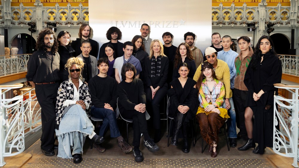 Delphine Arnault poses with the 20 semifinalists of the 2026 edition of the LVMH Prize for Young Designers