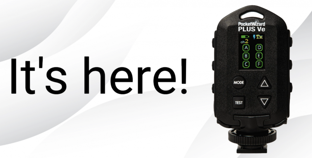 A black PocketWizard PLUS Vee device next to the bold text Its here! on a white background.